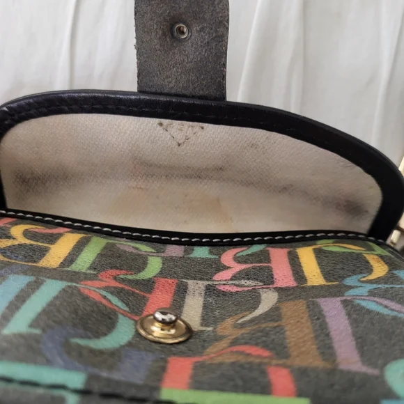 Dooney & Bourke Multi Scribble Wristlet With Strap And Signature Heart Charm